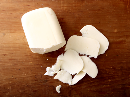 Grande Mozzarella Cheese on cutting board