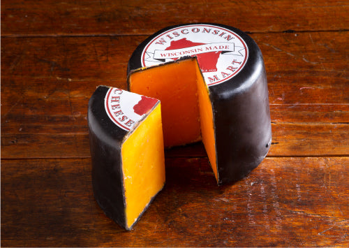 3 pound wax sealed wheel of cheddar cheese