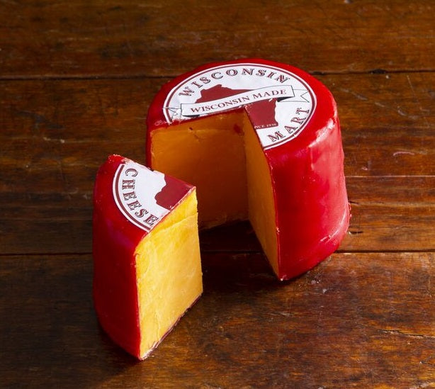 3 pound wax sealed wheel of cheddar cheese