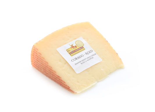 8 ounce piece of aged manchego curado cheese