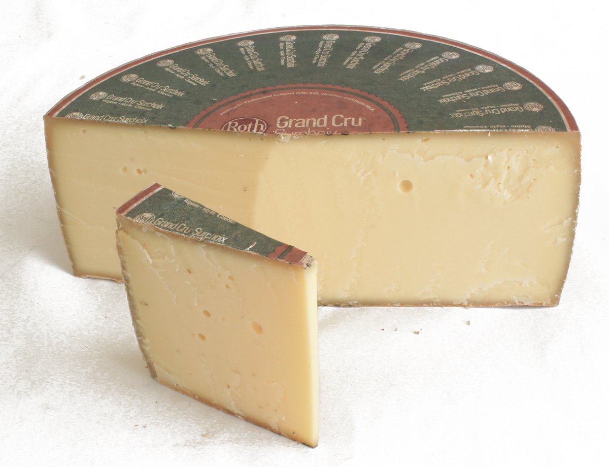 half wheel of grand cru surchoix alpine style cheese